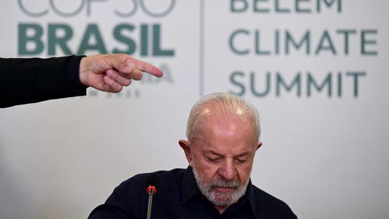 Brazil's President Luiz Inacio Lula da Silva arrives for a briefing with foreign media ahead of the COP30 UN Climate Change Conference
