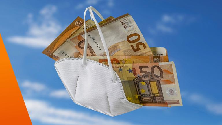 Atemmaske mit Geldscheinen