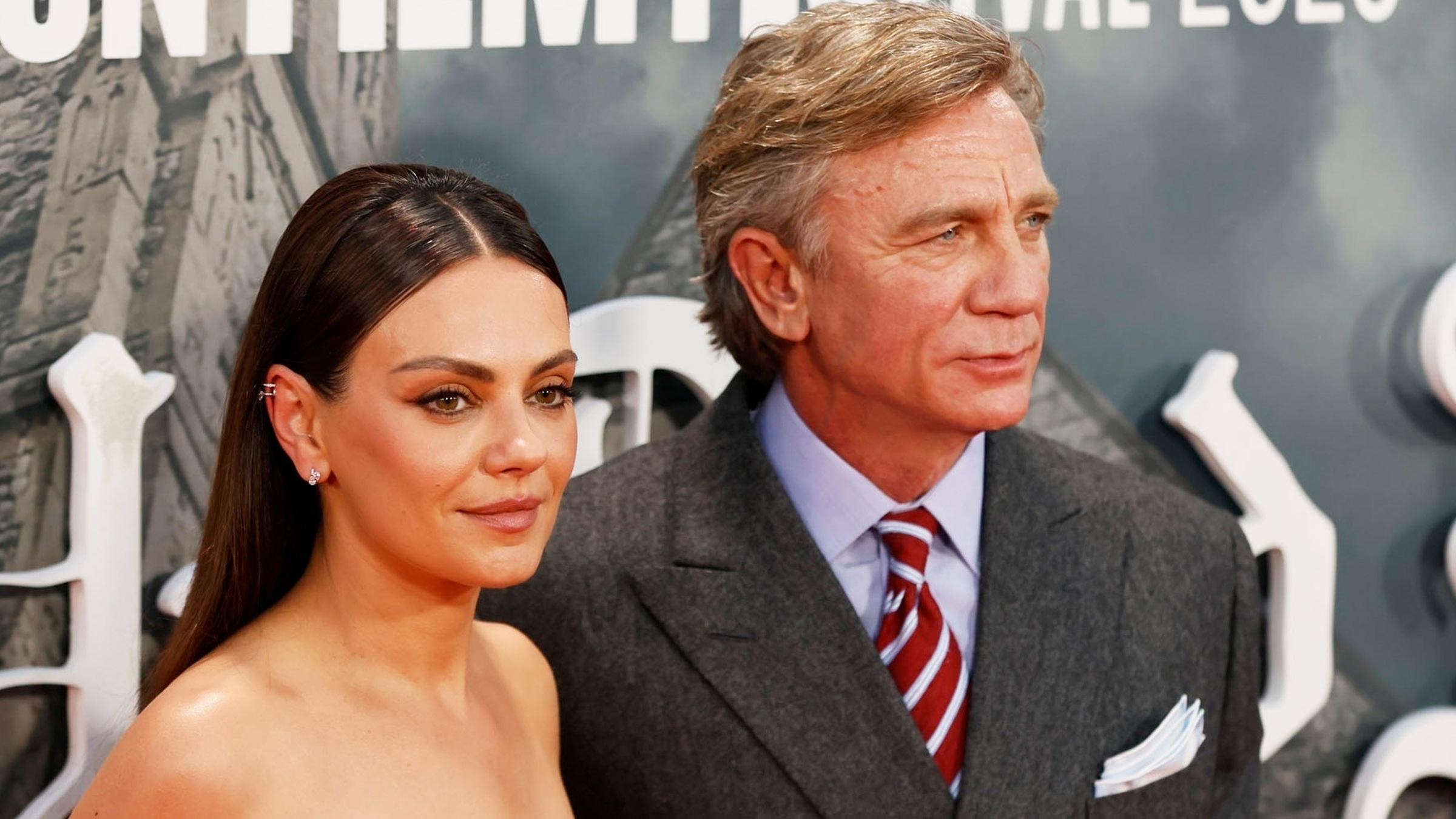 Daniel Craig und Mila Kunis nebeneinander auf einer Filmpremiere.
