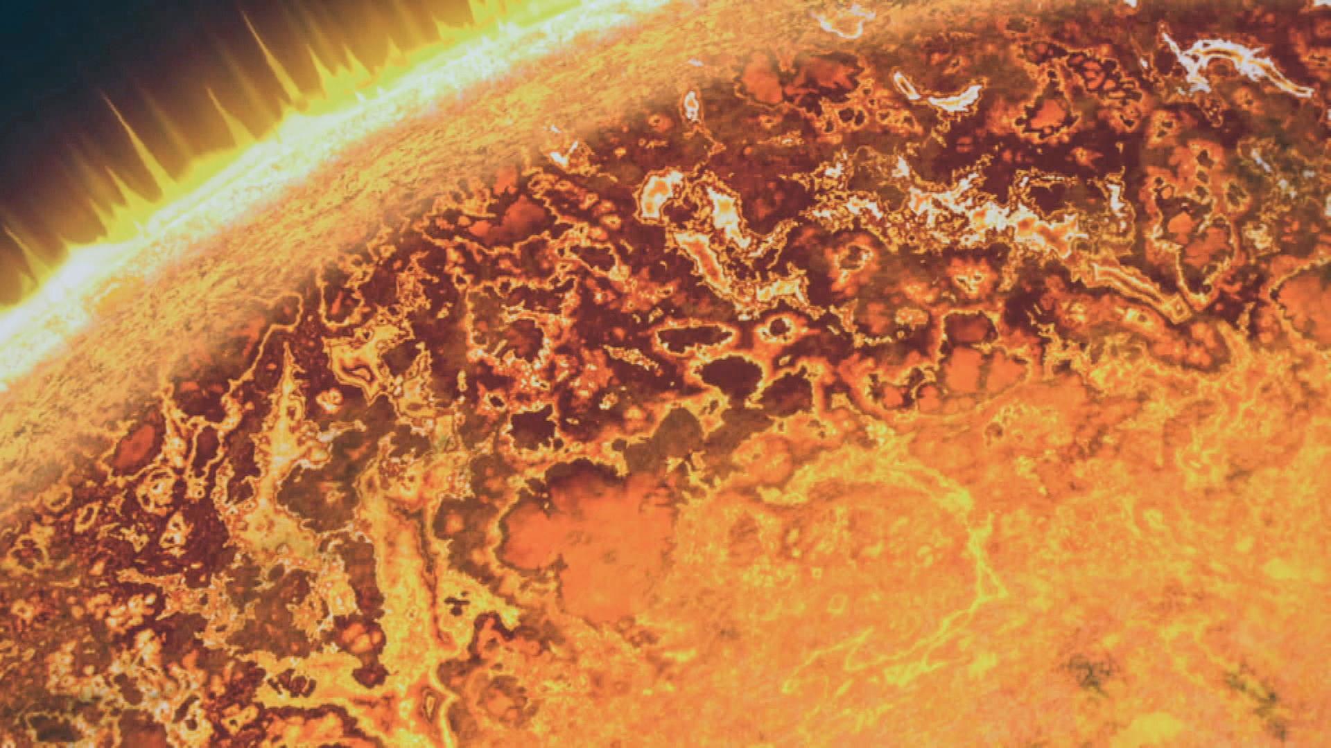  Computeranimation. Aus einem orangenen, glühenden Himmelskörper kommen gelbe Strahlen heraus.
