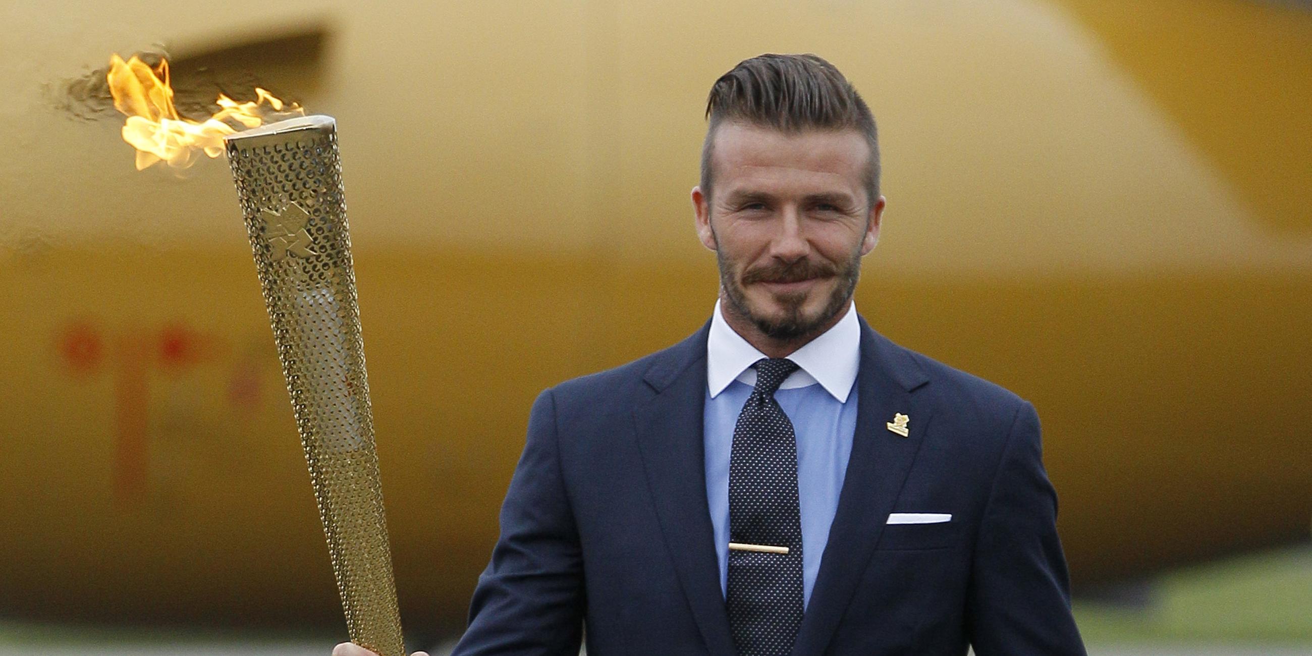 David Beckham mit olympischer Fackel im Jahr 2012.