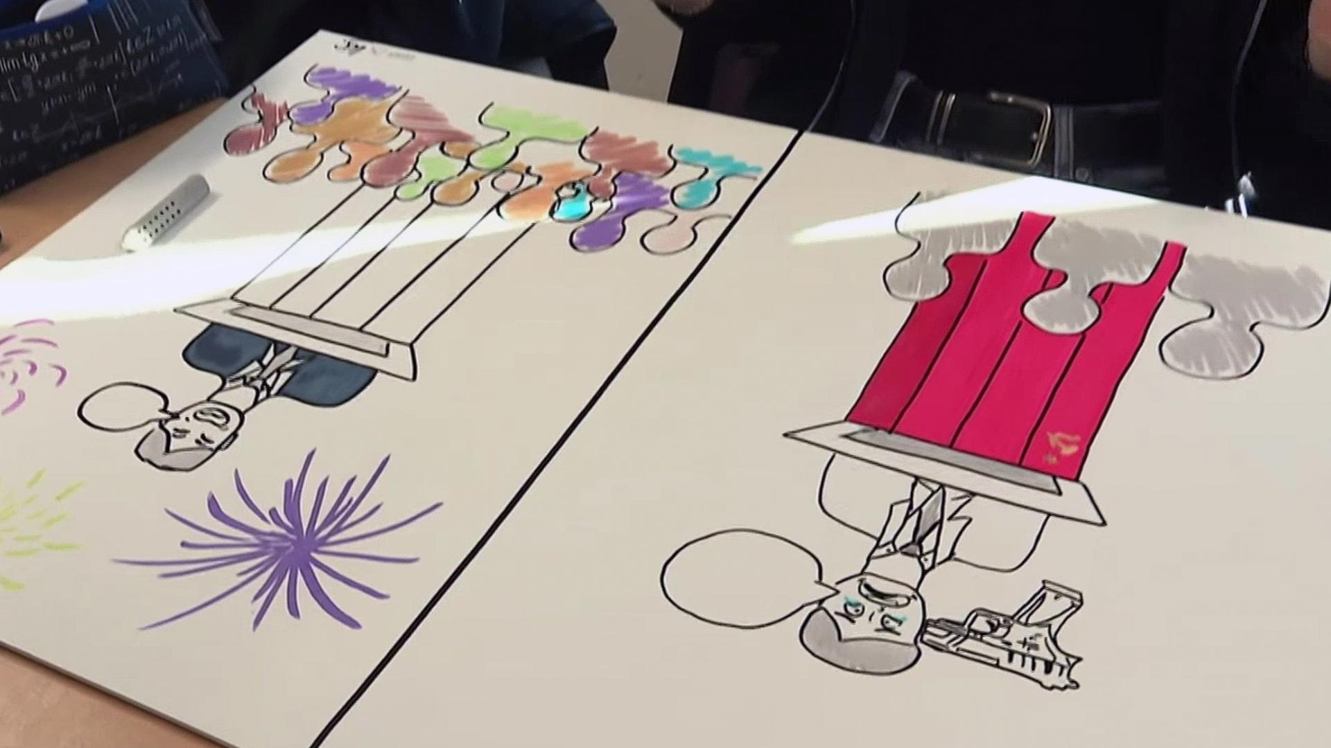 Berliner Comiczeichner helfen Schülern den Mauerfall näher zu bringen.