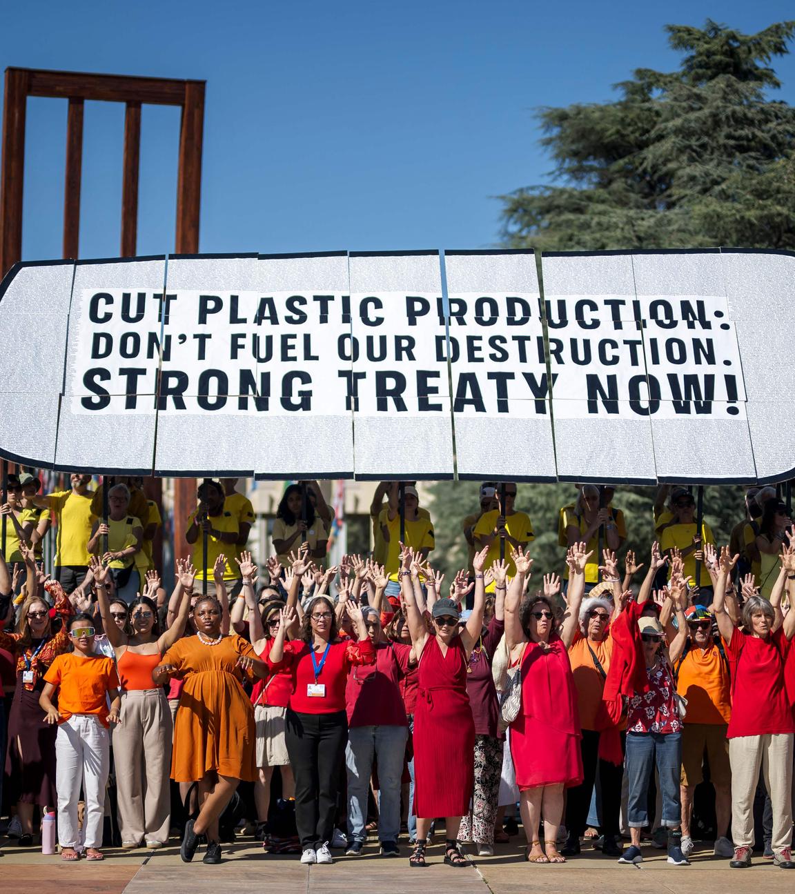 Activists stage a demonstation in front of the United Nations Offices in Geneva on August 4, 2025, on the eve a Plastics Treaty negotiations. 
