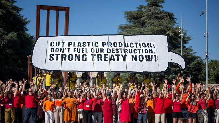 Activists stage a demonstation in front of the United Nations Offices in Geneva on August 4, 2025, on the eve a Plastics Treaty negotiations. 