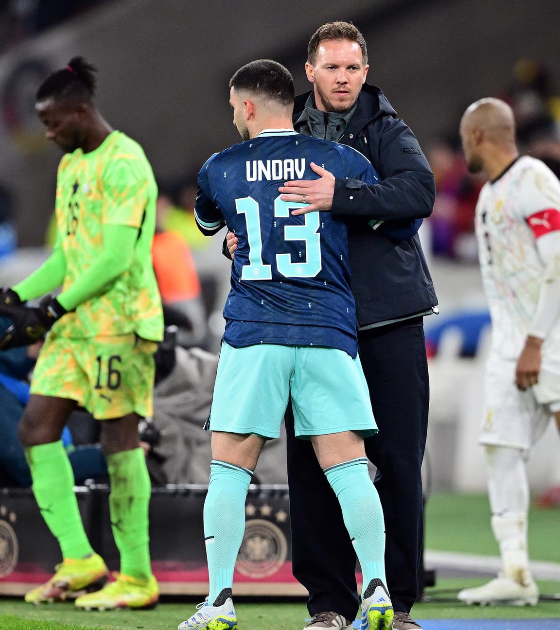 Fußball-Testspiel: Deutschland - Ghana. Deniz Undav (l.) und, Bundestrainer Julian Nagelsmann (Deutschland)