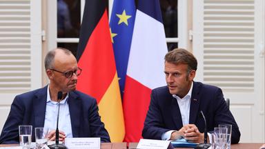 Bundeskanzler Merz und Frankreichs Präsident Macron.