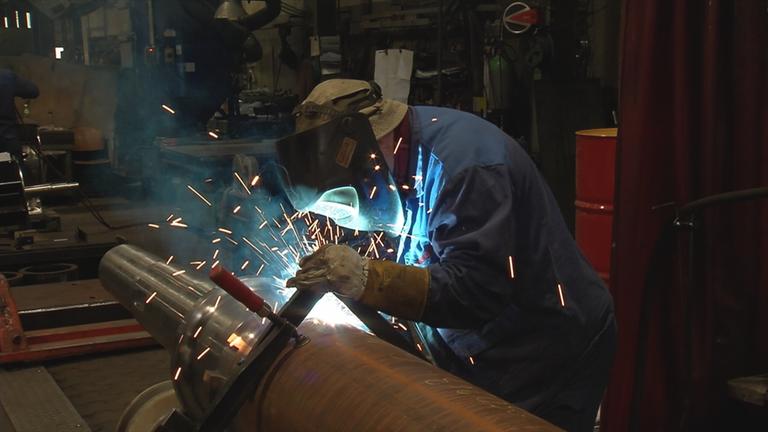 Schweißer in einem Betrieb