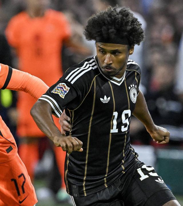 Mexx Meerdink und Karim Adeyemi am 24.09.26