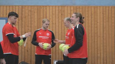 Handballnationalmannschaft beim Aufwärmen