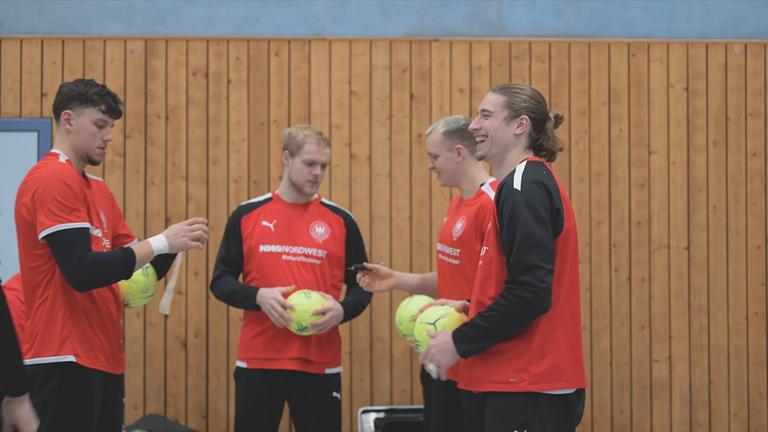 Handballnationalmannschaft beim Aufwärmen
