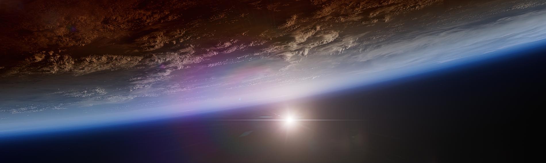 Animiertes Bild der Erdoberfläche aus dem All gesehen, eine dünne blaue Schicht umgibt den Planeten, im Hintergrund die Sonne.