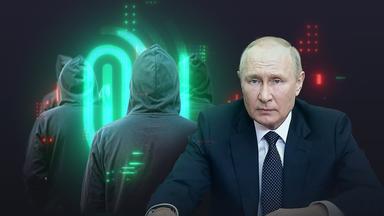 Putin, im Hintergrund das Spur-Logo