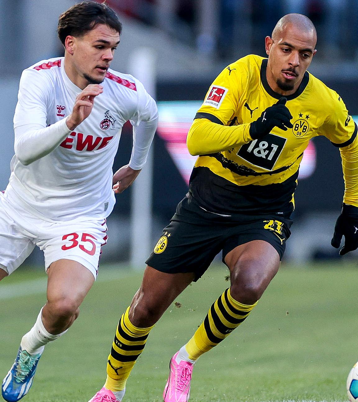 Max Finkgräfe (1. FC Köln) und Donyell Malen (Borussia Dortmund) im Zweikampf.