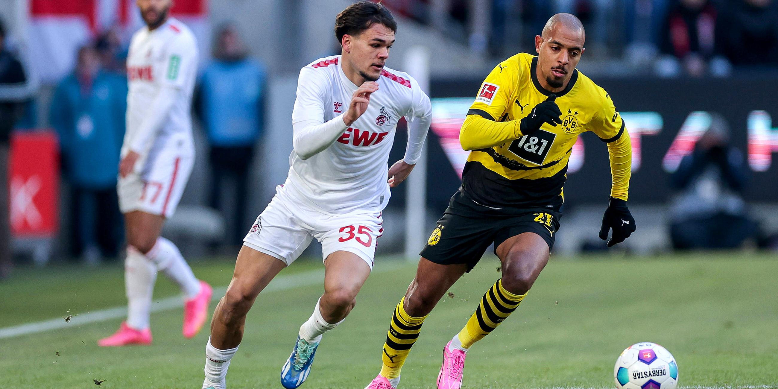 Max Finkgräfe (1. FC Köln) und Donyell Malen (Borussia Dortmund) im Zweikampf.