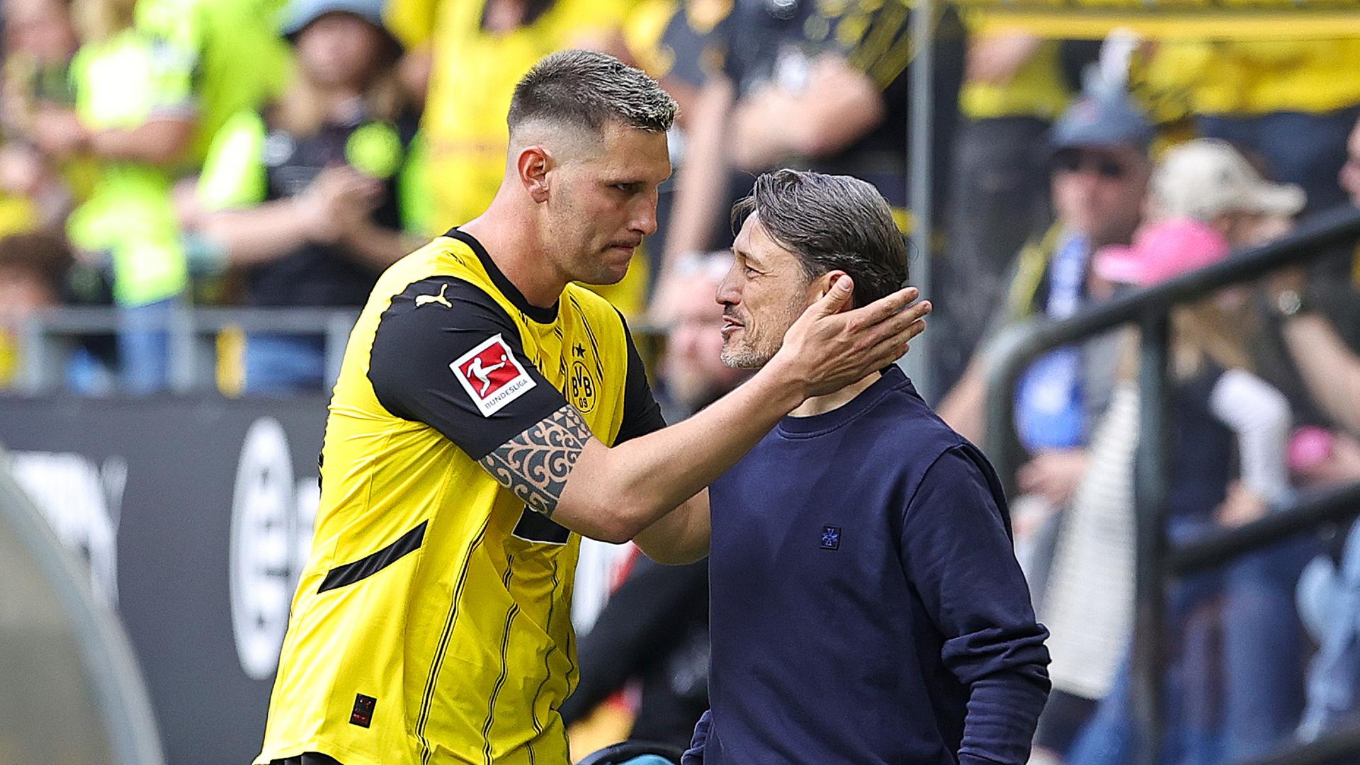 Niklas Süle und Trainer Niko Kovac des Borussia Dortmund am 17.05.2025.