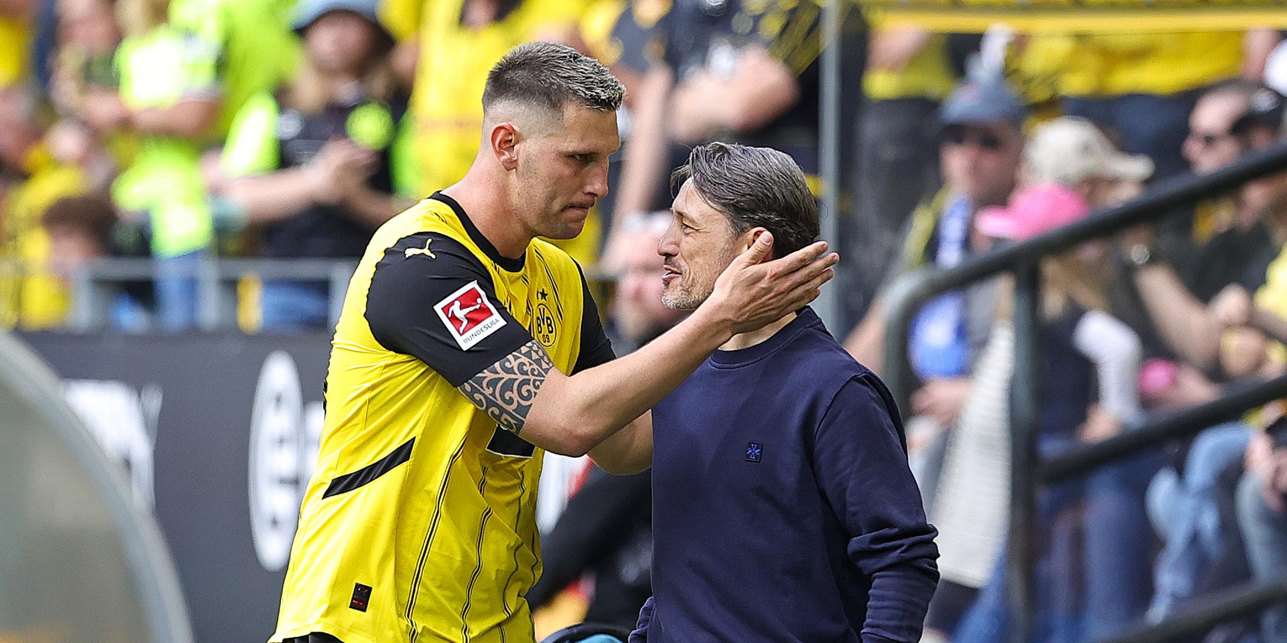 Niklas Süle und Trainer Niko Kovac des Borussia Dortmund am 17.05.2025.