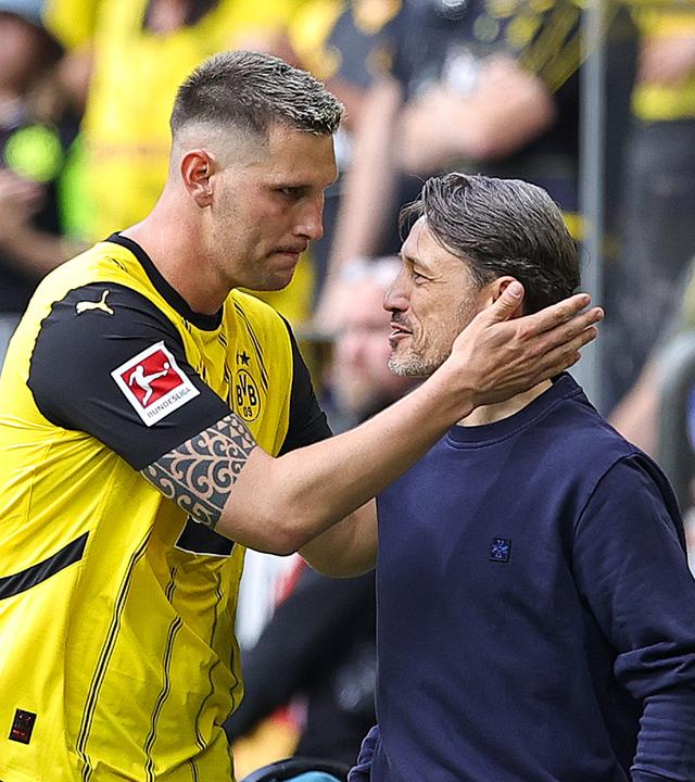 Niklas Süle und Trainer Niko Kovac des Borussia Dortmund am 17.05.2025.