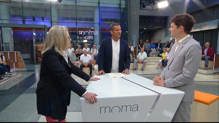 Ute Bonde, Mitri Sirin und Dustin Williams (rechts)