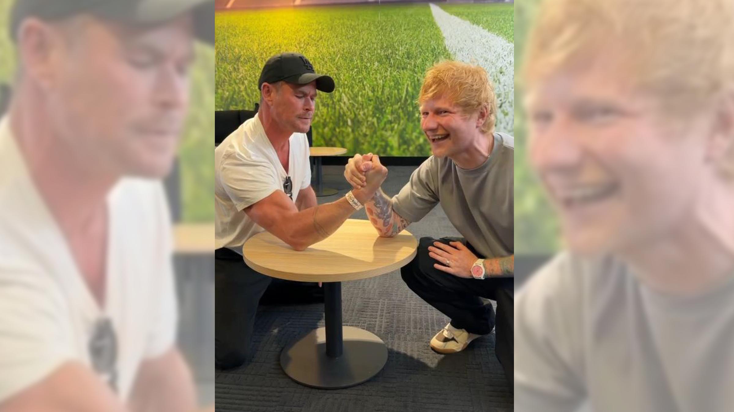 Ed Sheeran und Chris Hemsworth treten im Armdrücken gegeneinander an. 