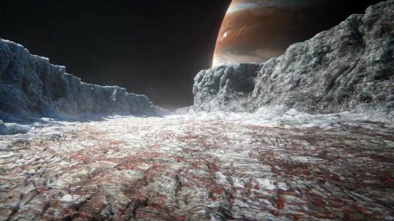 Computeranimiertes Bild einer breiten Schlucht in eisiger Landschaft, im Hintergrund ein großer Himmelskörper, dessen Oberfläche mit verschiedenfarbigen Streifen bedeckt ist.