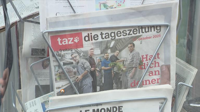 Taz in Zeitungsständer 