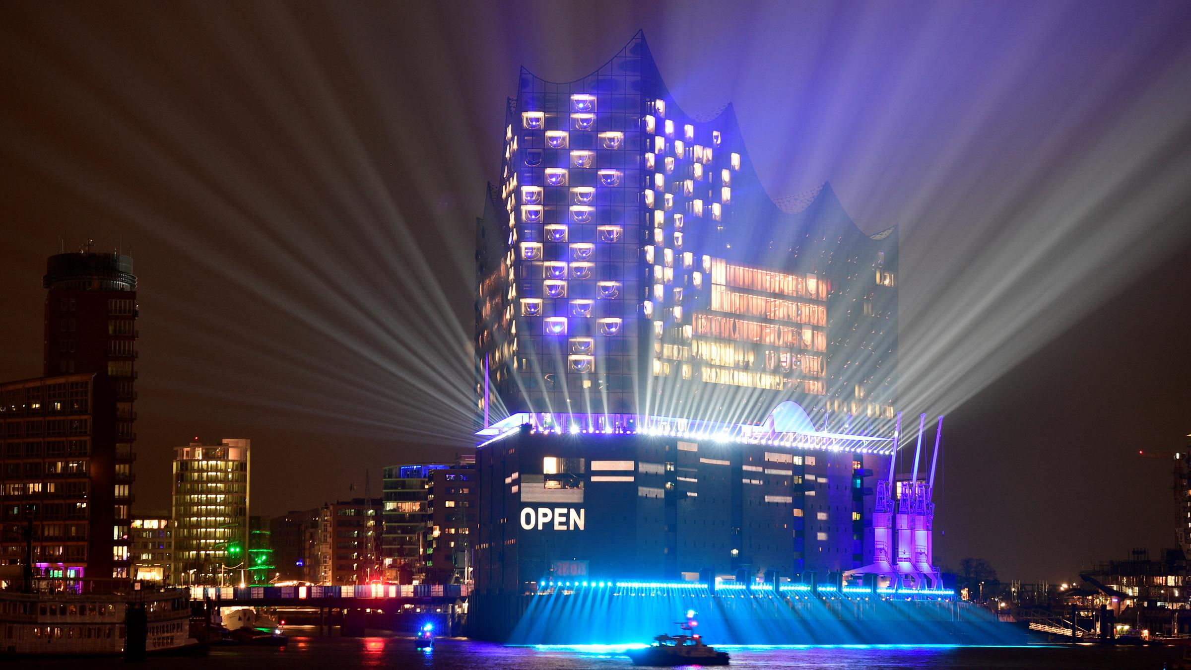 the new philharmonic hall elbphilharmonie is illuminated during its opening ceremony in hamburg