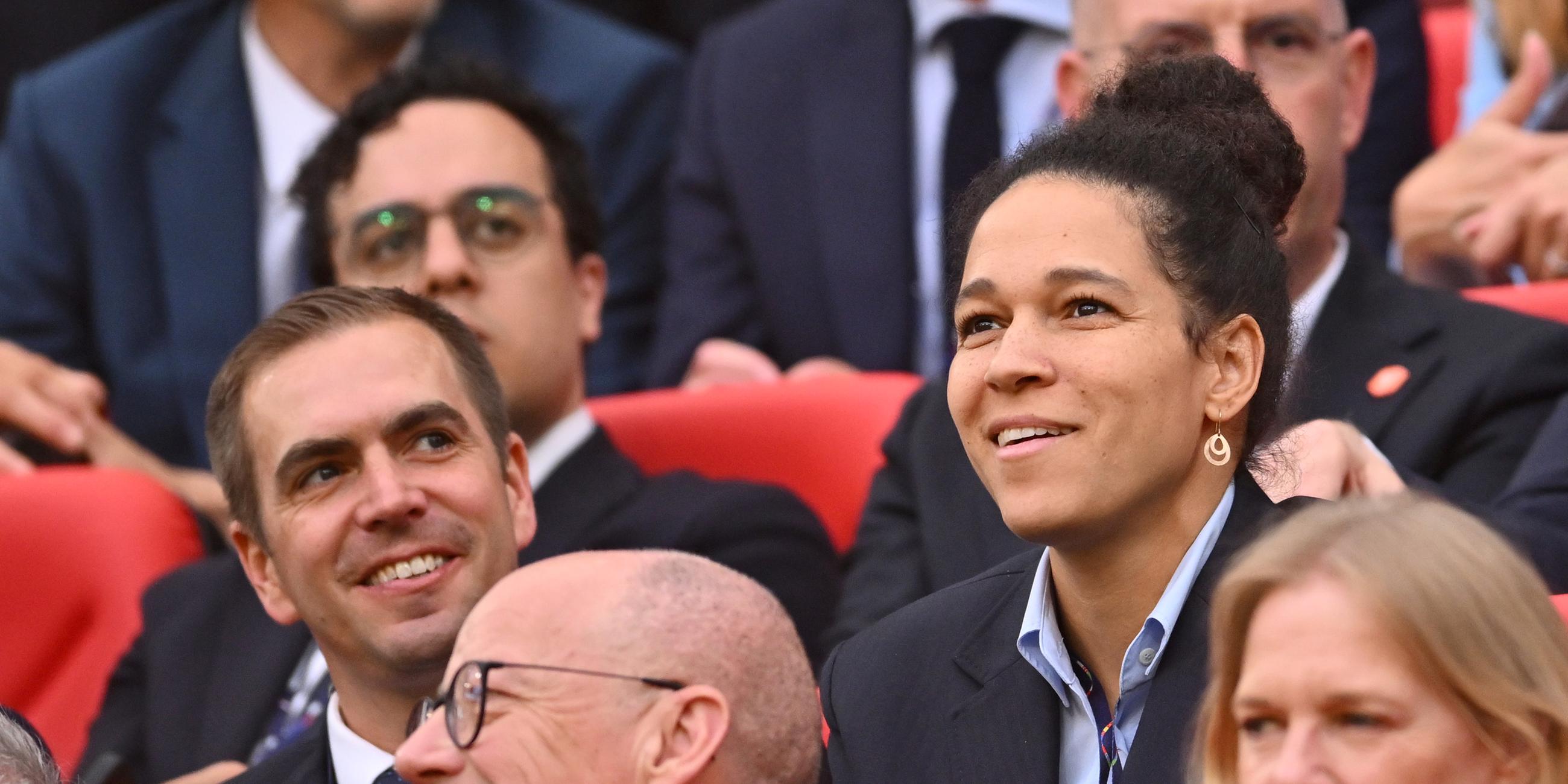 Philipp Lahm und Celia Sasic auf der Tribüne.
