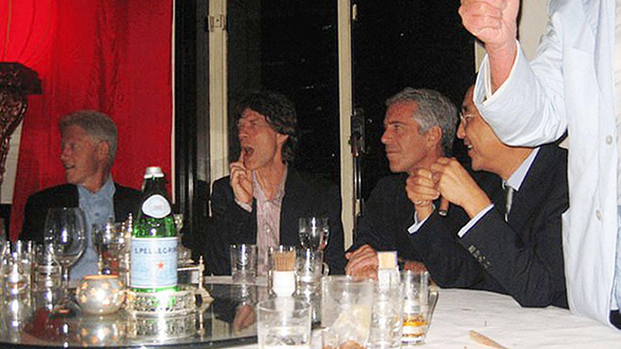 Epstein Files: Der ehemalige Präsident Bill Clinton am Tisch mit Mick Jagger und Jeffrey Epstein.