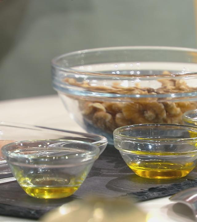 Walnüsse, Fisch und Öle als Omega-3-Quellen im Überblick.
