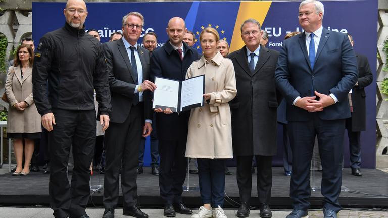 Ukraine's Prime Minister of Ukraine Denys Shmyhal, Danish Minister of Business Morten Bodskov, French Foreign Minister Jean-Noel Barrot, EU High Representative for Foreign Affairs and Security Policy Kaja Kallas, and Ukrainian Foreign Minister Andrii Sybiha show a signed document during a EU-Ukraine Foreign Ministers' meeting in Lviv.
