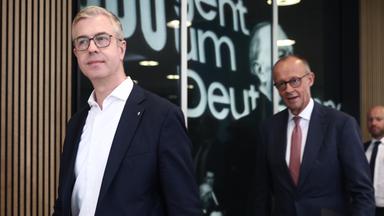 Stefan Evers und Friedrich Merz