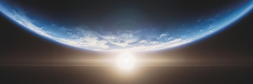 Computeranimation der Oberfläche eines erdähnlichen Planeten aus dem Weltall gesehen. Im Hintergrund ein Stern