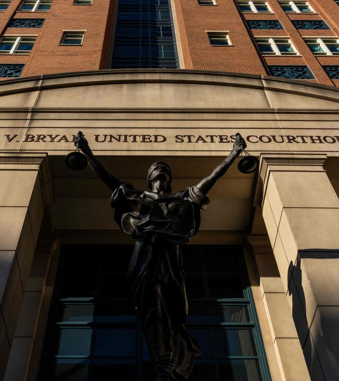 The sun illuminates the Albert V. Bryan United States Courthouse on the morning following indictment charges filed against.