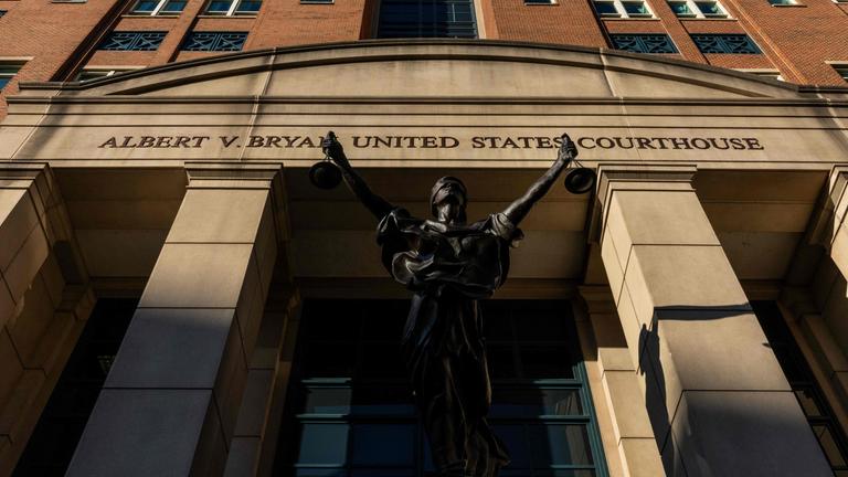 The sun illuminates the Albert V. Bryan United States Courthouse on the morning following indictment charges filed against.