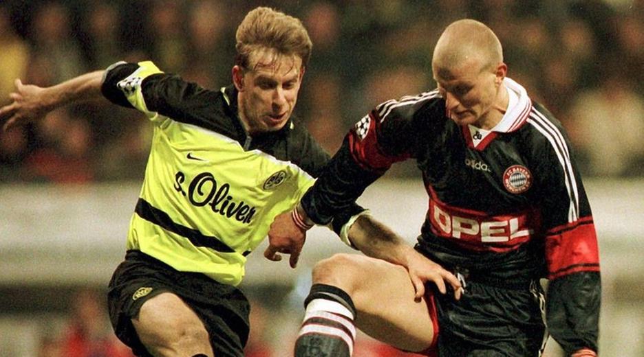 Bildnummer: 00051116  Datum: 18.03.1998  Copyright: imago/WEREK Bayerns Carsten Jancker mit Ball attackiert von J�rg Heinrich; Zweikampf, BVB Borussia Dortmund - FC Bayern M�nchen Champions League, Saison 1997/1998, Viertelfinale, R�ckspiel Dortmund Westfalenstadion Dynamik, Kampf, Fu�ball EC 1 Herren Mannschaft Deutschland Gruppenbild Aktion Personen