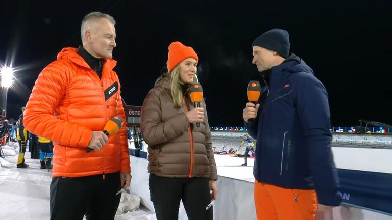 ZDF-Biathlon-Experten Denise Herrman-Wick und Sven Fischer mit Moderator Alexander Ruda