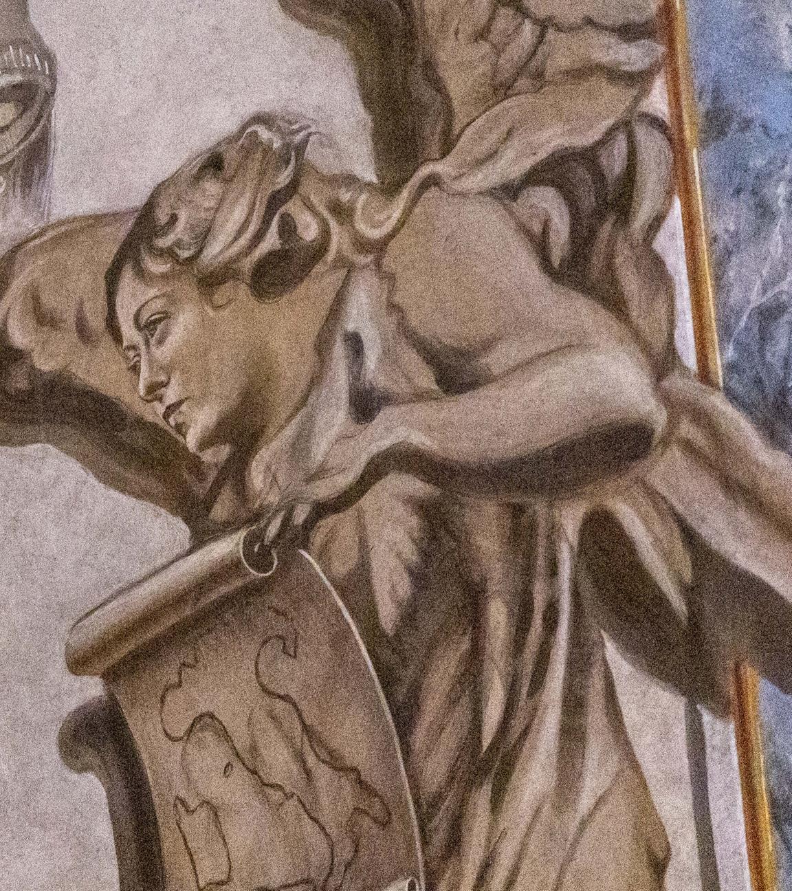 Besucher kommen in die Basilika San Lorenzo in Lucina, um die Restaurierung des Freskos mit der Darstellung des Engels Giorgia Meloni zu sehen. 