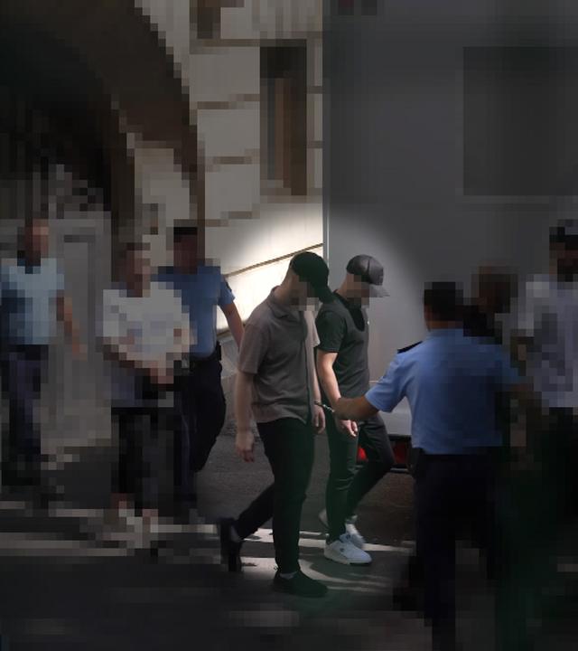 Tatverdächtige Ukrainer am Prozesstag in Bukarest