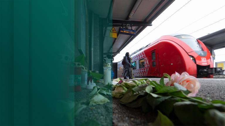 Blumen an Bahnsteig zum Gedenken an den tödlichen Angriff auf einen Bahnmitarbeiter