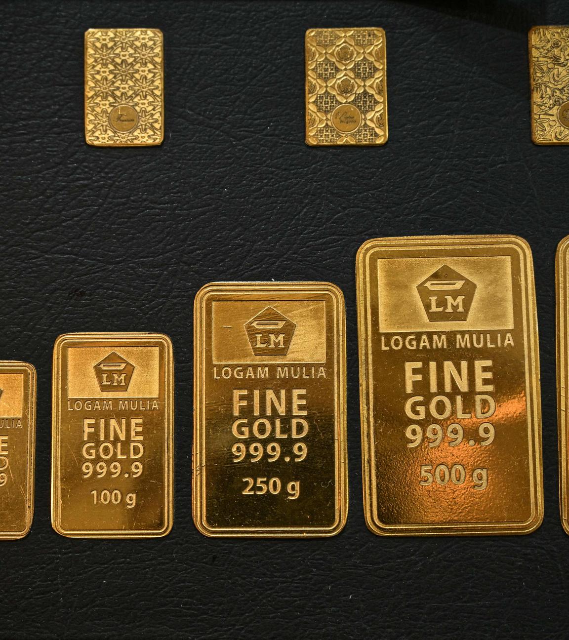 Gold wafers are displayed.