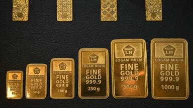 Gold wafers are displayed.