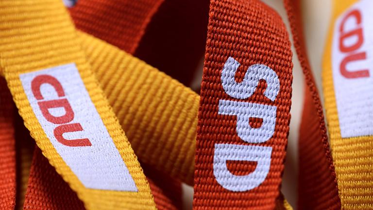 Logos von CDU und SPD