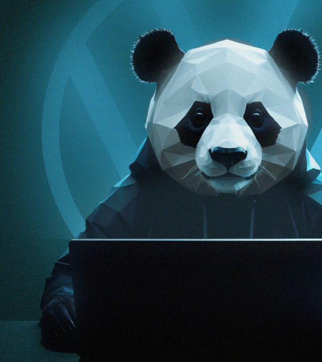 Panda-Bär (Figur) am Laptop 