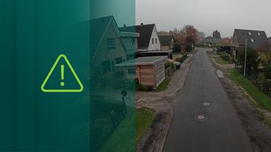 Straße inmitten von Häusern