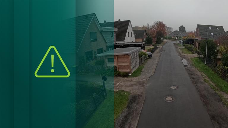 Straße inmitten von Häusern