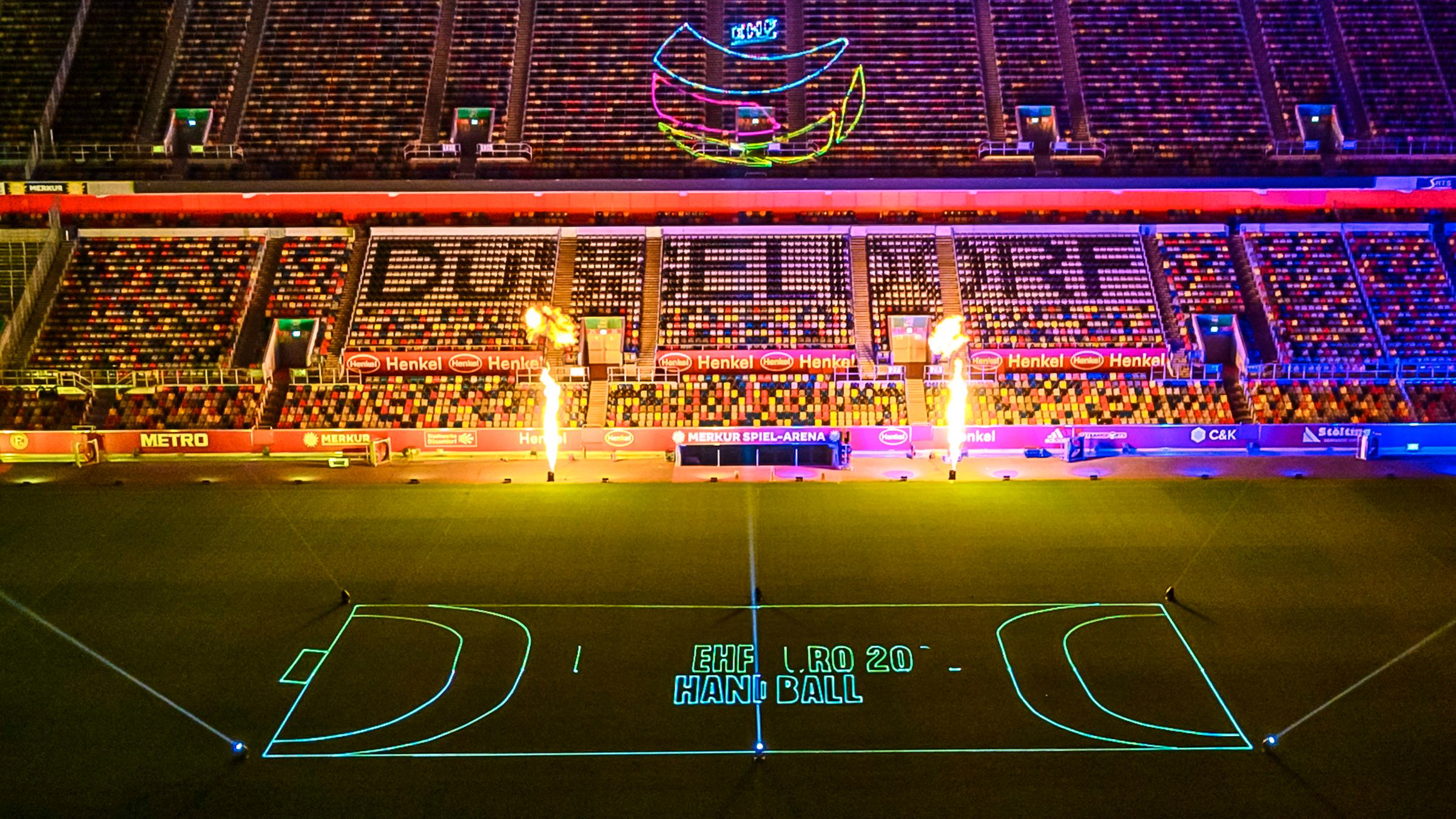 Die Merkur Spiel Arena mit Lichtshow in Düsseldorf.