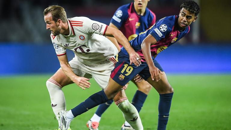 Harry Kane und Lamine Yamal im Kampf um den Ball