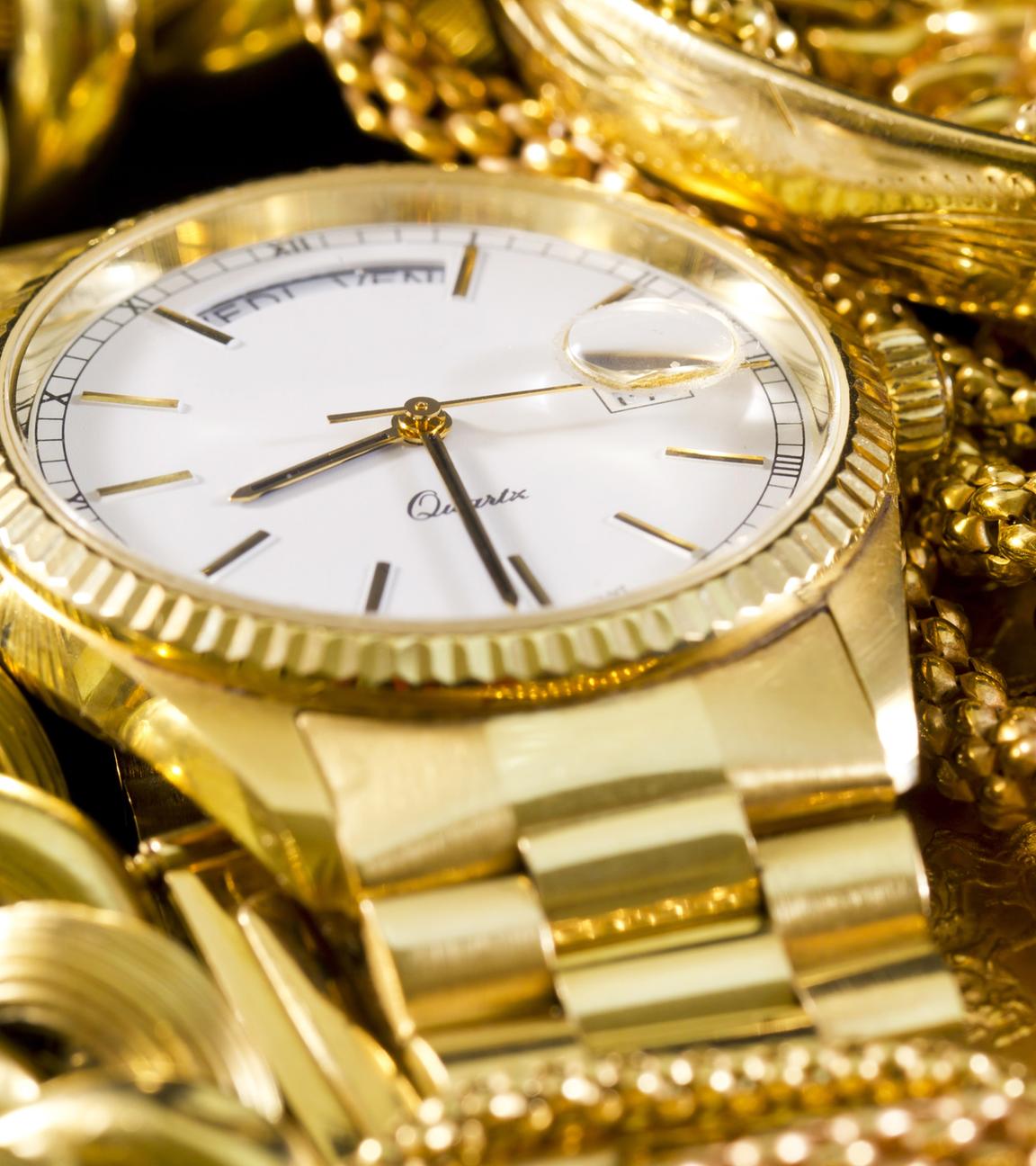 Goldener Schmuck, goldene Uhr