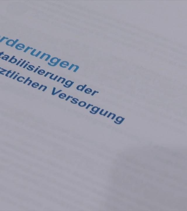 Ein blatt auf dem es um die hausärztliche Versorgung geht 
