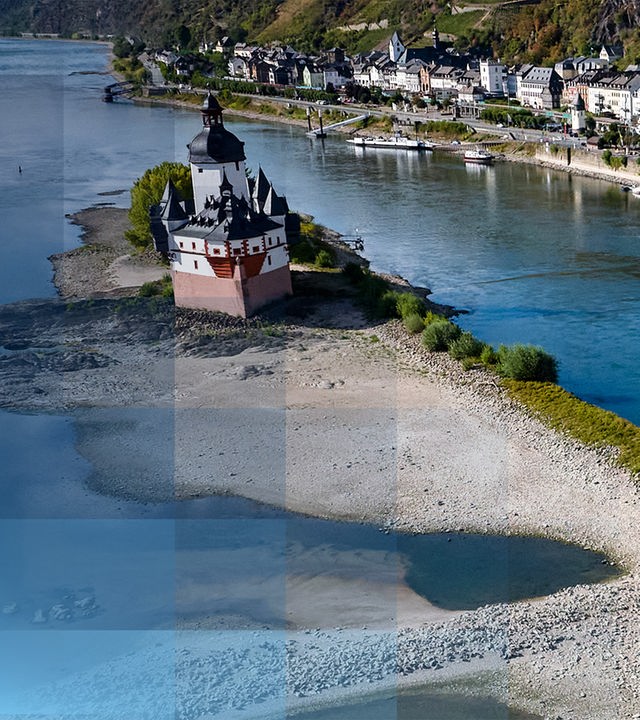 Kaub: Die Burg Pfalzgrafenstein im Rhein ist nur noch von wenig Wasser umgeben.